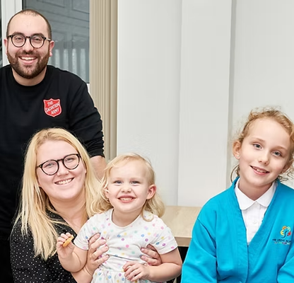 A smiling family in Watford